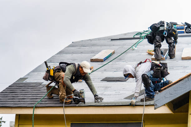 Professional Gutter Installation technician working in Ocean Isle Beach, NC